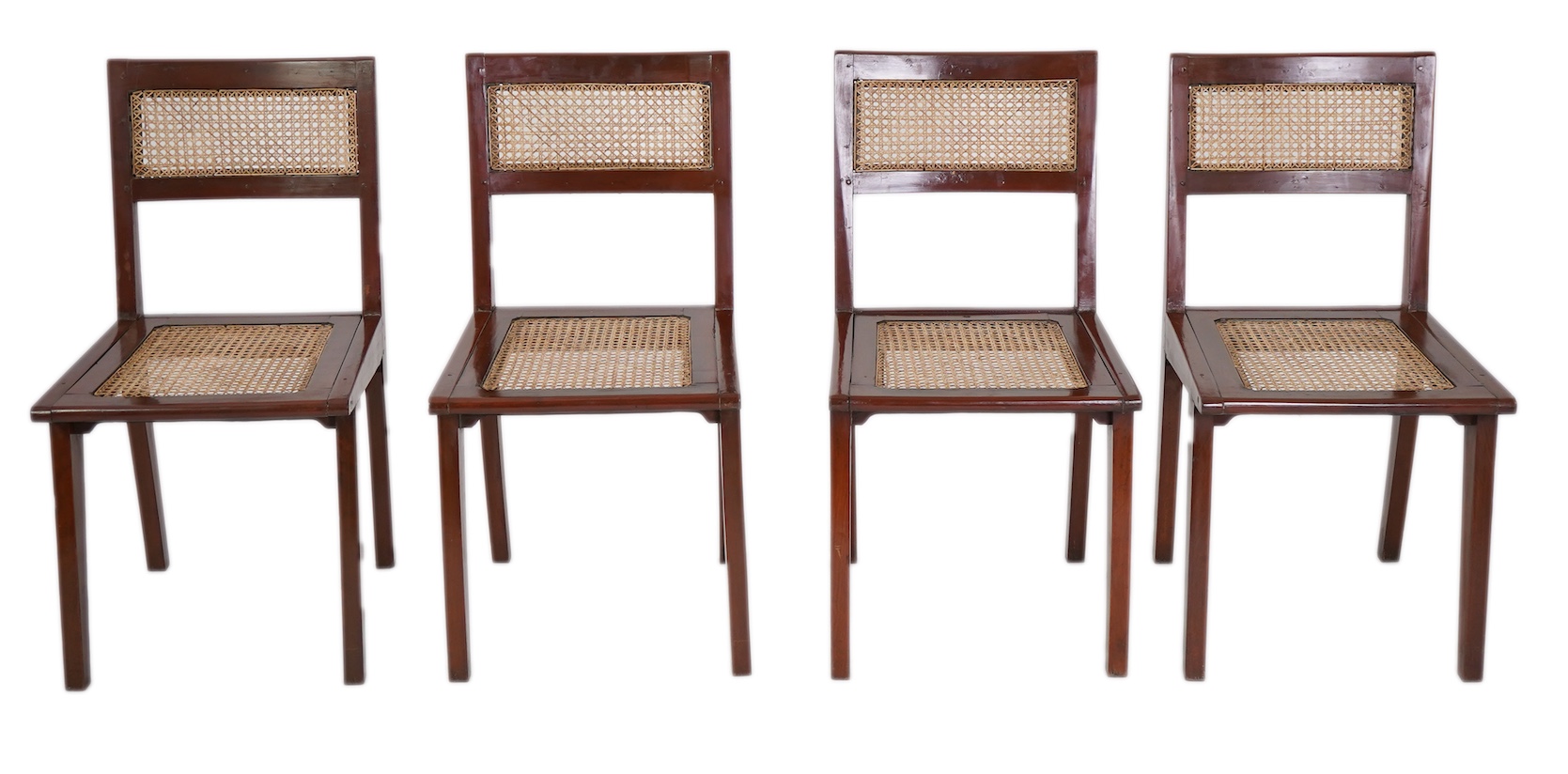 Pierre Jeanneret (Swiss, 1896-1967) for Chandigarh: A set of four solid solid teak and braided canework chairs PJ-010501